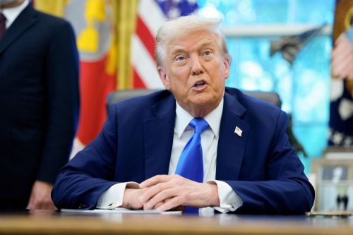 Donald Trump speaks to media in the Oval Office