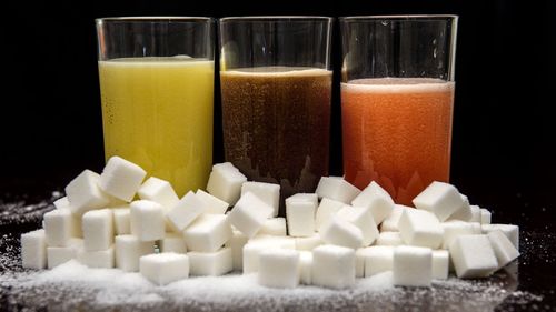 There have been renewed calls for a sugary beverages tax to be introduced nationally, amid a mounting case against sugar. (AAP)