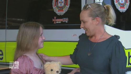 Young Mackay girl handed award for rescuing young relative
