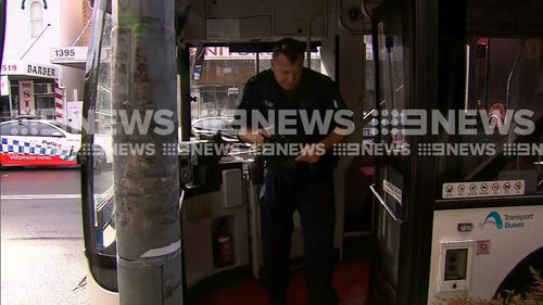 Police are talking to the bus driver. Picture: 9NEWS