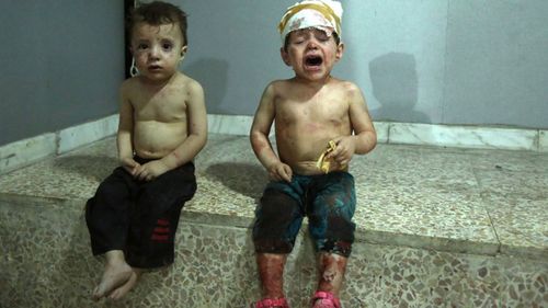 Toddlers wait to be treated in a clinic in Damascus. (Photo: AFP)