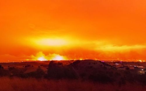Bushfires light up the night sky over Camperdown, in Victoria's southwest, yesterday. (Facebook: Hangingpixels Photo Art)