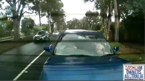 The girl's face can be seen hitting the dashboard of the vehicle. (Dash Cam Owners Australia)