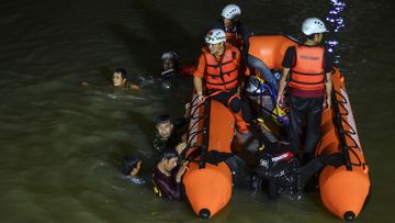 A frantic rescue mission was launched on a river in Ciamis, West Java, after more than 20 students slipped in during an excursion. 