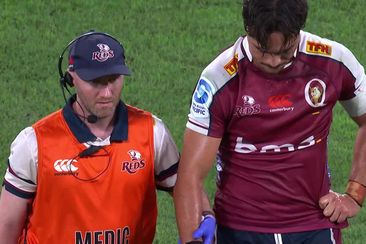 Queensland Reds star Jordan Petaia leaves the field with a suspected shoulder injury.