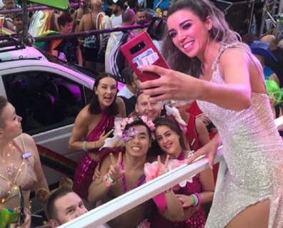 Dannii greets fans at Mardi Gras in 2018.