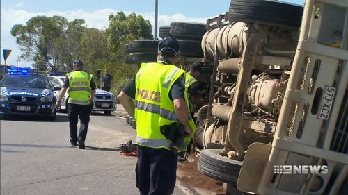 Steve Spencer was left dangling unconscious when his 46-tonne truck overturned on a Gold Coast roundabout (Supplied).