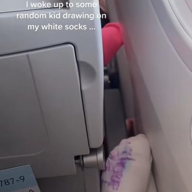 passenger complains child draws on socks on flight reddit post