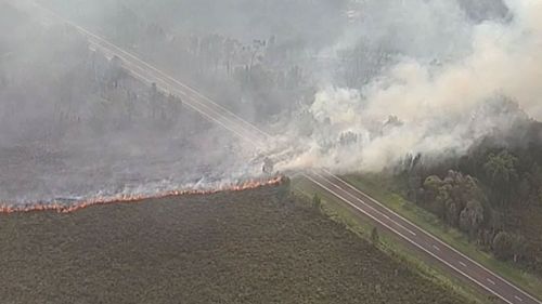 The fire started in a national park before breaking containment lines. (Choppercam)