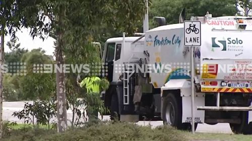 The truck driver is assisting police.  (9NEWS)