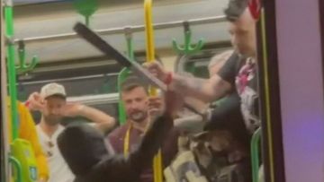 Wild brawl breaks out on Melbourne tram and spills out onto street 