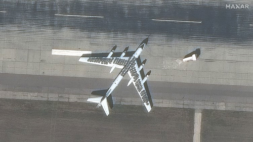 A satellite image of a Russian plane covered with car tyres, potentially to protect it from Ukrainian drone strikes.