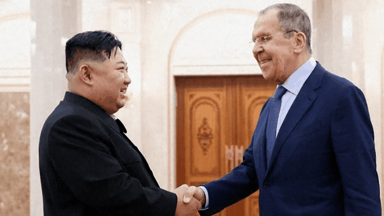 North Korea's Kim boasts of hermit state's achievements in key meeting