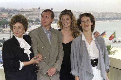 FILE - From left actress Joan Plowright, director Peter Greenaway, actresses Joely Richardson and Juliet Stevenson from the film "Drowning by numbers" pose for a photo after the showing of their film on Thursday, May 19, 1988 in competition at the 41st Cannes Film Festival in Cannes. (AP Photo/Pierre Gleizes, File)