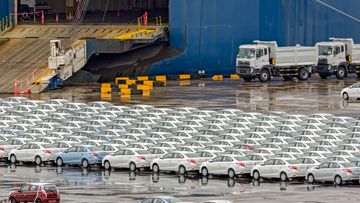 Rows of new cars waiting to be dispatch and shipped around the world from the biggest and busiest cargo port in Malaysia.