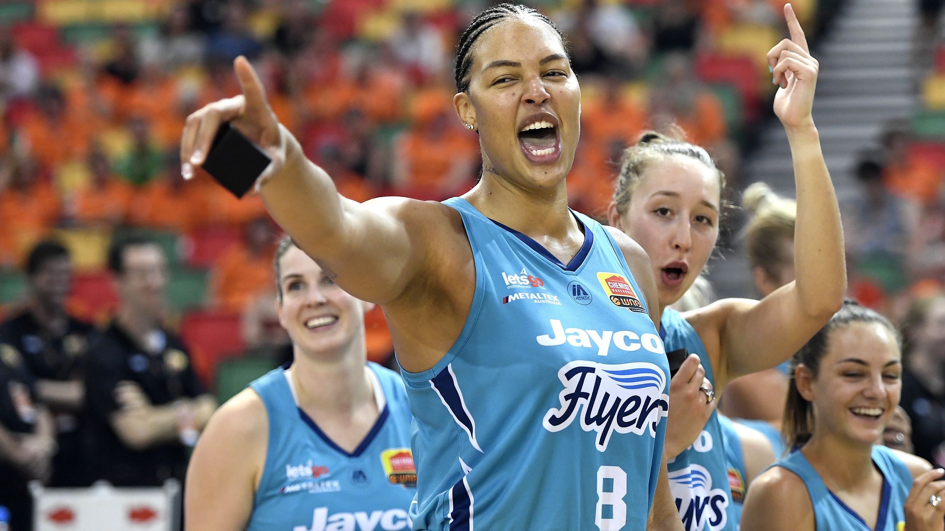 Liz Cambage and the Southside Flyers celebrate victory.