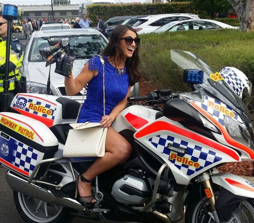 Cup cop pusher earlier posed for happy snap on police bike