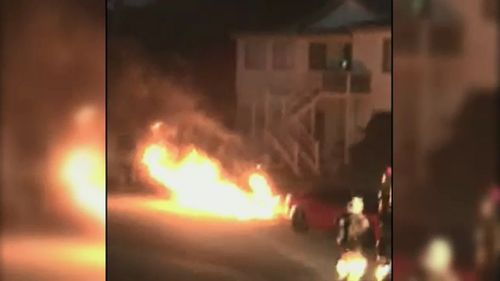 Residents filmed the car fire. (9NEWS)