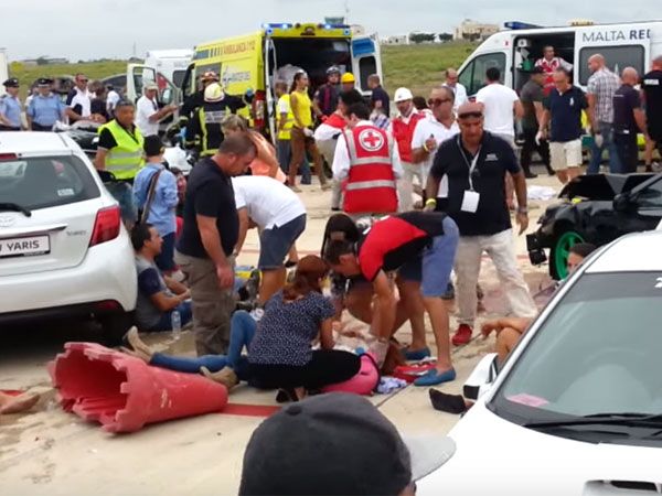 Victims are treated after the crash in Malta. (Supplied)