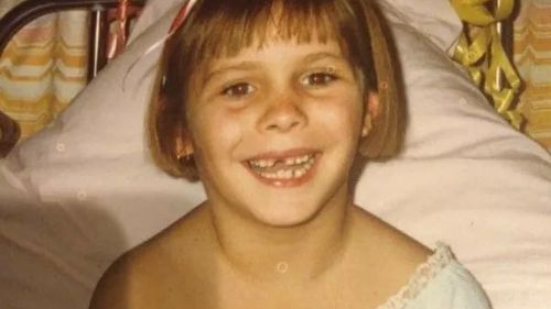 Laine Bradley contracted measles as a baby during a trip to Sydney.
