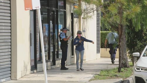 A woman was killed after being struck by a car in Bankstown.