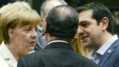 Greek Prime Minister Alexis Tsipras, right, speaks with German Chancellor Angela Merkel, left, and French President Francois Hollande. (AAP)