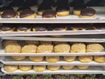A delivery van packed with 10,000 fresh doughnuts was stolen when the driver left it to go inside a service station.