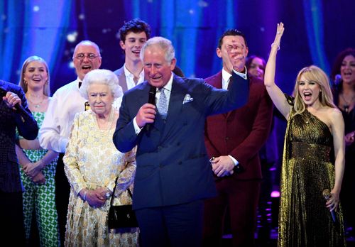 Queen Elizabeth II and Prince Charles onstage with Kylie Minogue at this year's The Diamond Jubilee Concert outside Buckingham Palace. Picture: PA