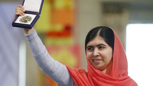 Nobel Peace Prize winner Malala Yousafzai from Pakistan receives her award. Picture: AAP