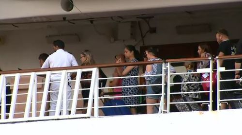 Cruise ship passengers were seen disembarking the ship in Sydney this morning. (9NEWS)