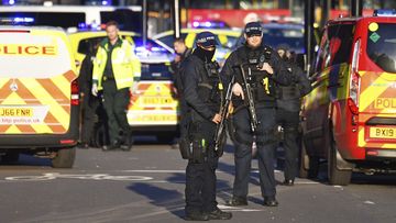 Counter-terrorism police at the scene of the London attack.