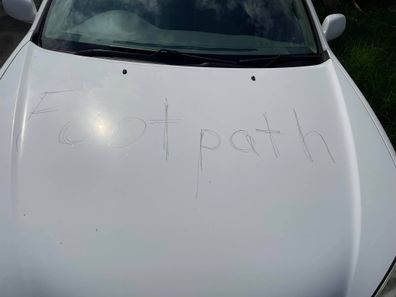'Footpath' message left on grandparents' car