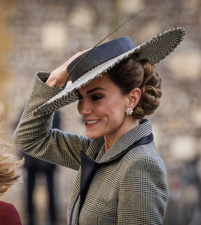 Kate Middleton holds onto her hat as she arrives for Archbishop of  Canterbury ceremony with Prince William - 9Honey