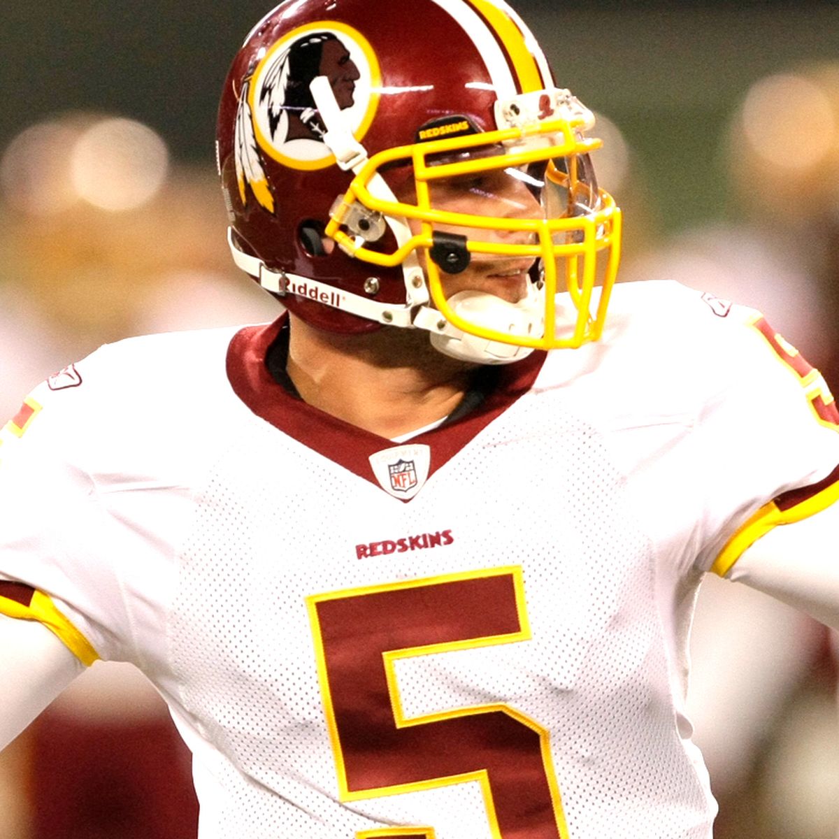 Washington Redskins' quarterback Colt Brennan watches from the