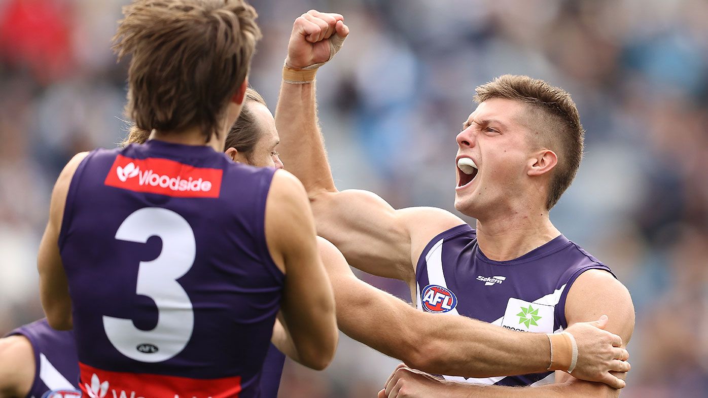 Fremantle solidifies status as premiership contenders after breaching Geelong's fortress