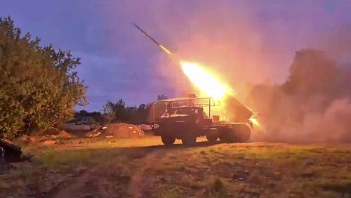 In this photo, taken from video and distributed by Russian Defense Ministry Press Service on Wednesday, May 14, 2025, a Russian self-propelled multiple rocket launcher fires towards Ukrainian positions in Ukraine. (Russian Defense Ministry Press Service via AP)