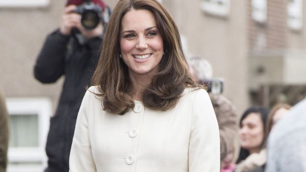 Kate Middleton Duchess of Cambridge shows off baby bump in her favourite coat