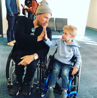 Dylan Alcott disability with a boy in a wheelchair