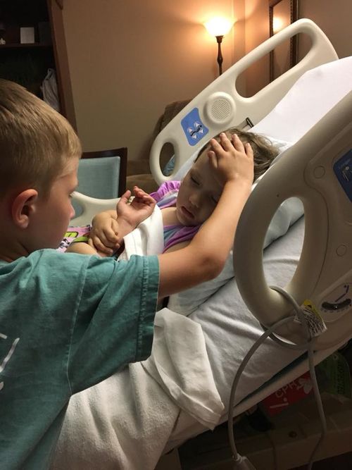 The heart-wrenching photo of Jackson Sooter comforting his little sister. Picture: Facebook