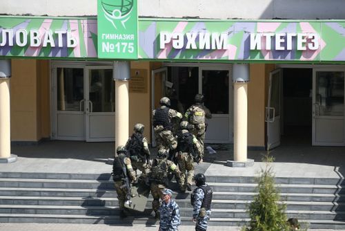 KAZAN, RUSSIA  MAY 11, 2021: FSB officers by school No 175 where two attackers opened fire; at least one teacher and eight students are reported dead. Yegor Aleyev/TASS (Photo by Yegor AleyevTASS via Getty Images)