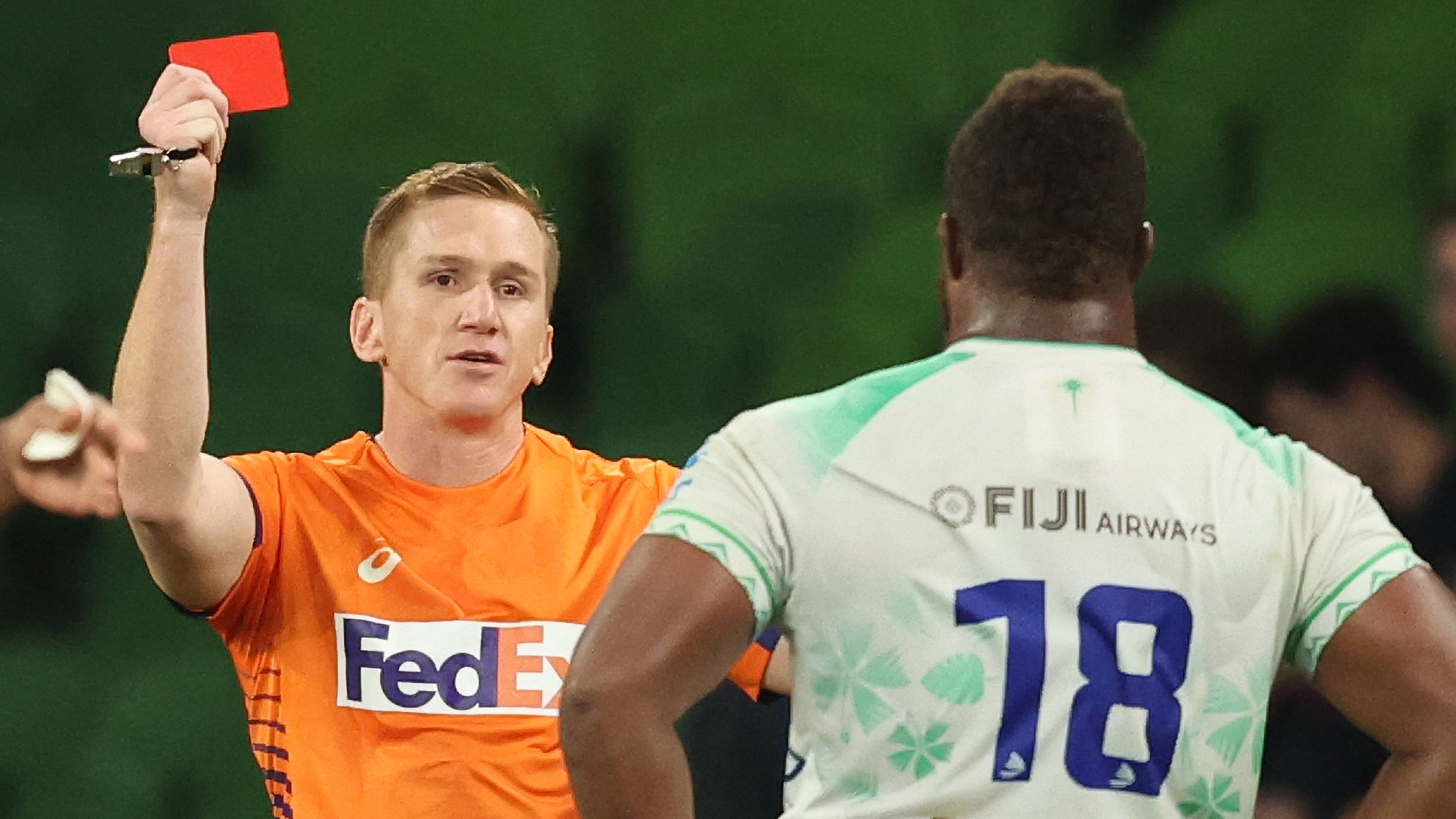 The referee shows the red card to Jone Koroiduadua of Fijian Drua during the round seven Super Rugby Pacific match against the Rebels.