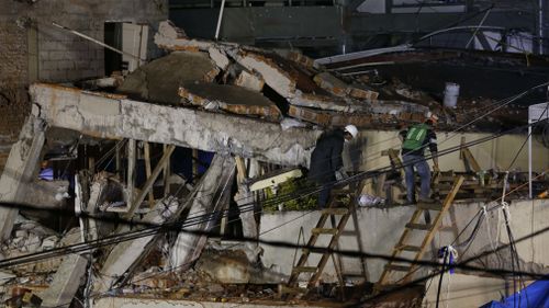 Buildings collapse in Mexico City.