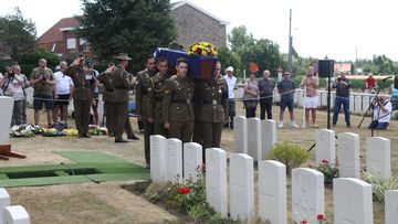 Pallbearer party, formed of Australian Army&#x27;s Jonathan Church Award recipients, carry the casket of an unknown Australian WW1 soldier at Tyne Cot Cemetery in Zonnebeke, Belgium.  
