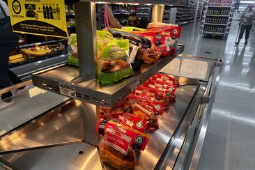 coles roast chickens display