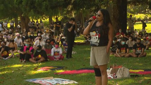 A speaker at the Invasion Day protest in Sydney.