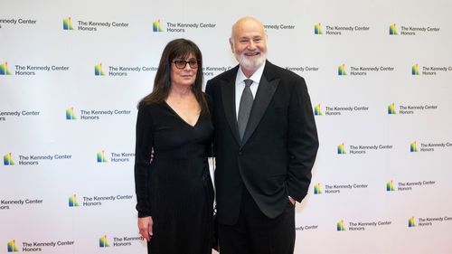 Rob Reiner and Michele Singer Reiner arrive on the red carpet at the State Department for the Kennedy Center Honors gala dinner. They were both found stabbed to death at their Los Angeles home.