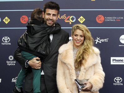 Gerard Pique and Shakira with their sons Milan Pique (L) and Sasha Pique in 2016