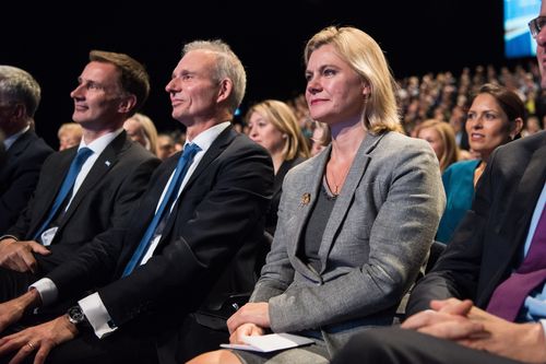 ustine Greening listens to Prime Minister Theresa May's speech at the Conservative Party Conference. (AAP)