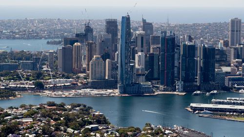 The NSW government is launching more $100 vouchers to lure office workers back into the CBD. Sydney CBD skyline city generic stock file 