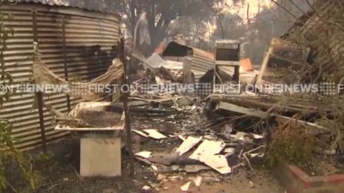 There are reports that dozens of homes have been destroyed. (9NEWS)